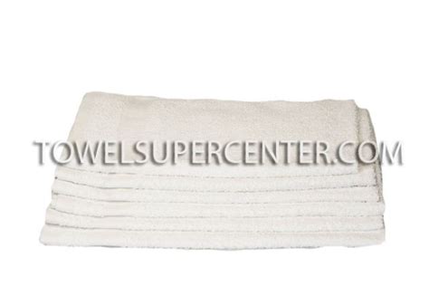 Towel supercenter - Add a small amount of fabric softener to your load of towels in the wash. One half of a cap is sufficient. Once washed, add the towels to the dryer with a large piece of nylon netting. Take the towels out of the dryer and use a lint roller to remove any extra lint on the towels. 